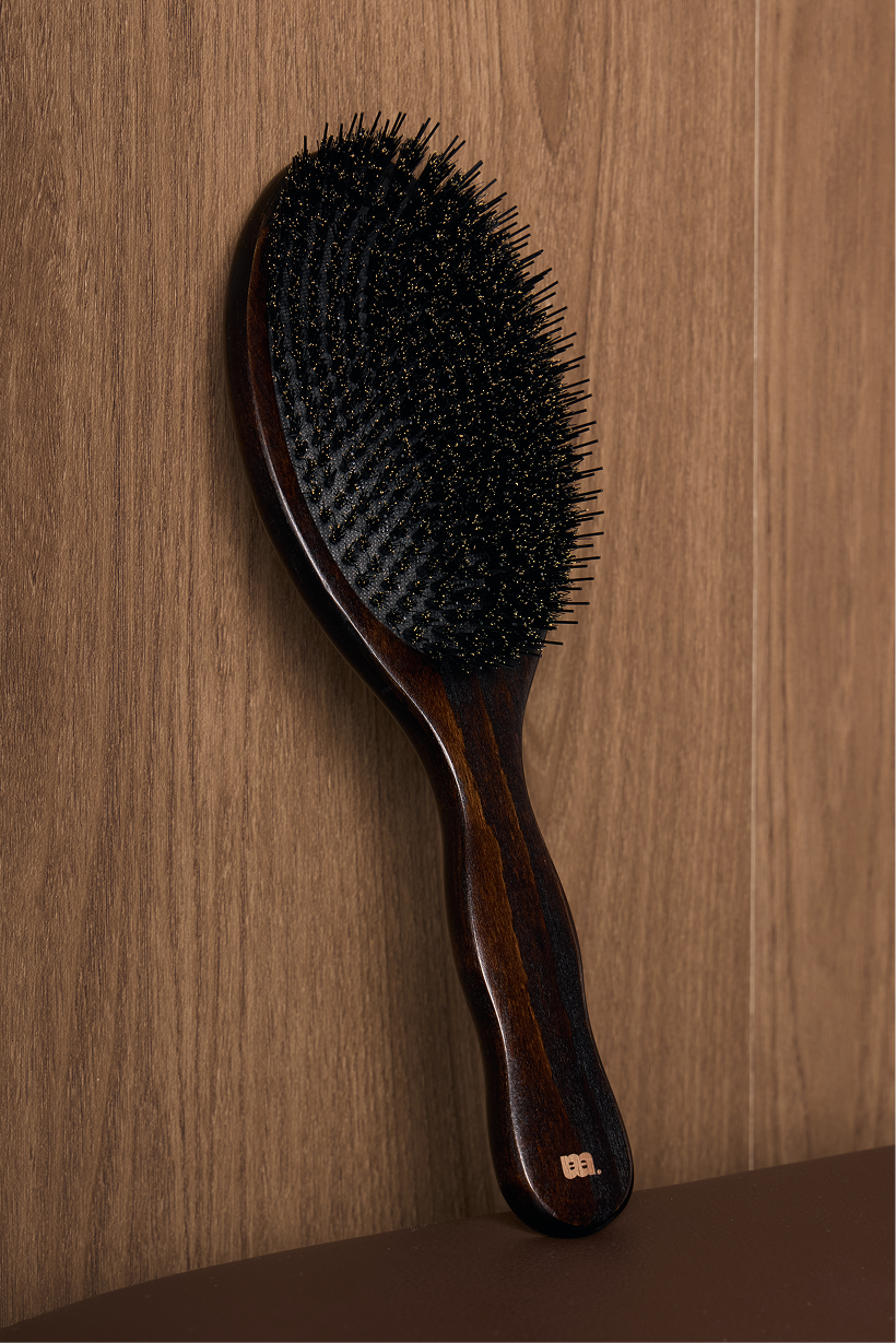 boar bristle brush smoothing hair for sleek, glossy finish by maene 